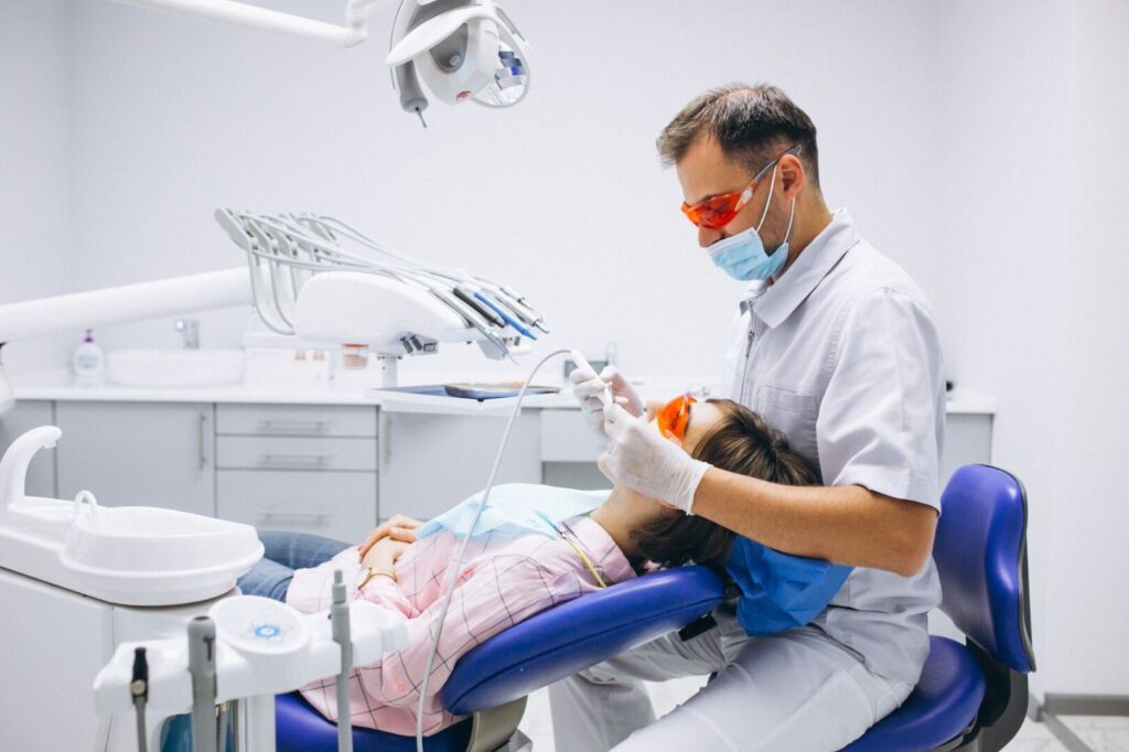 woman patient dentist